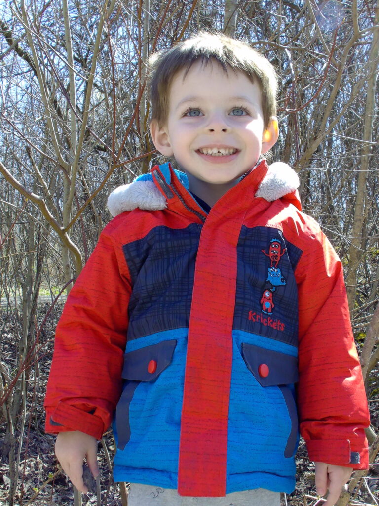 Smiling toddler thinks free is good