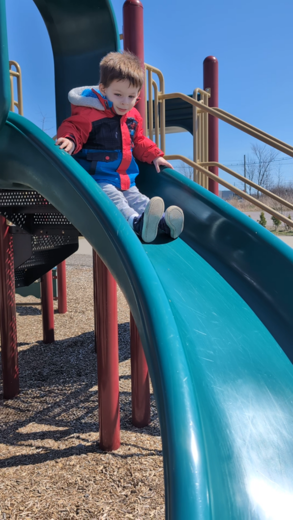 Son on the Heartland Forest slide